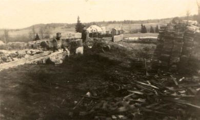 The Stone Barn is shown in the distance.
